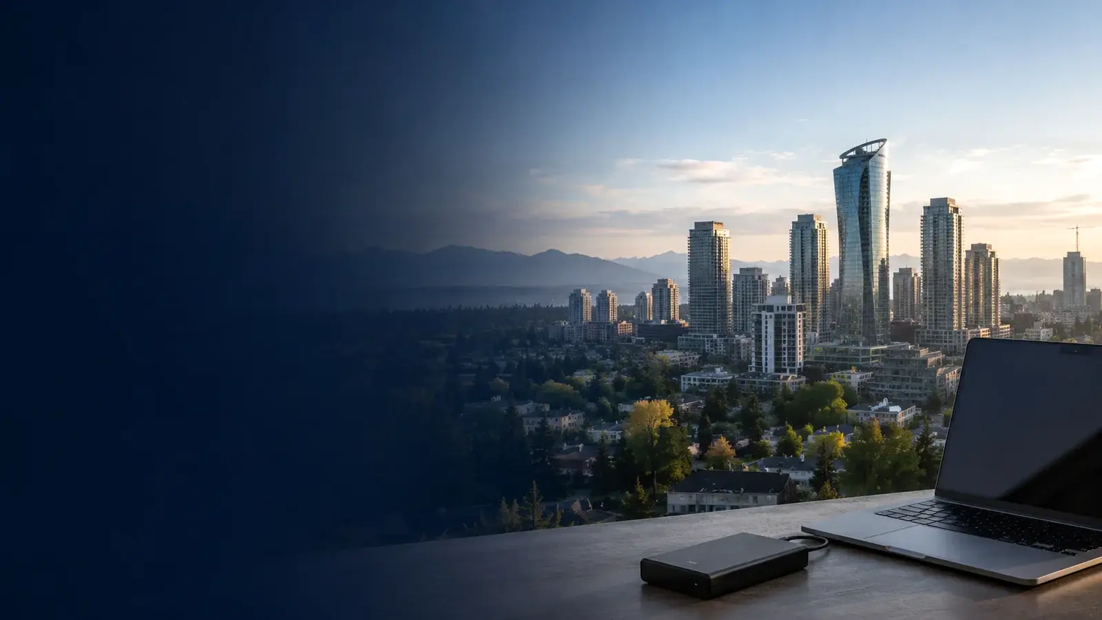 Surrey BC city centre skyline with laptop and external hard drive, TeraDrive data recovery